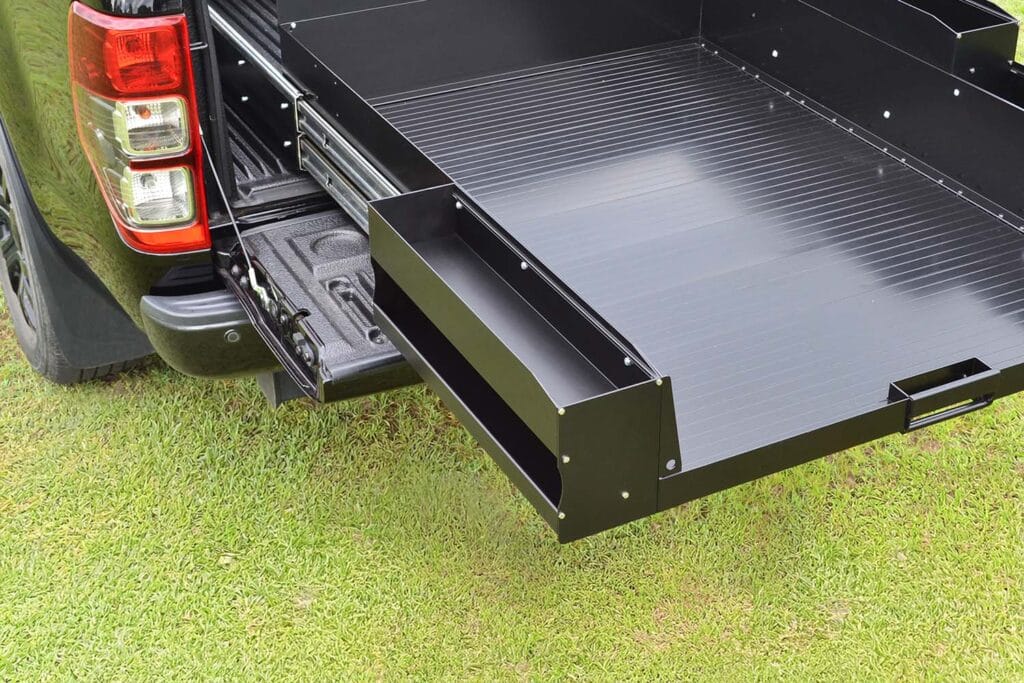 ute storage tray showing a side box compartment