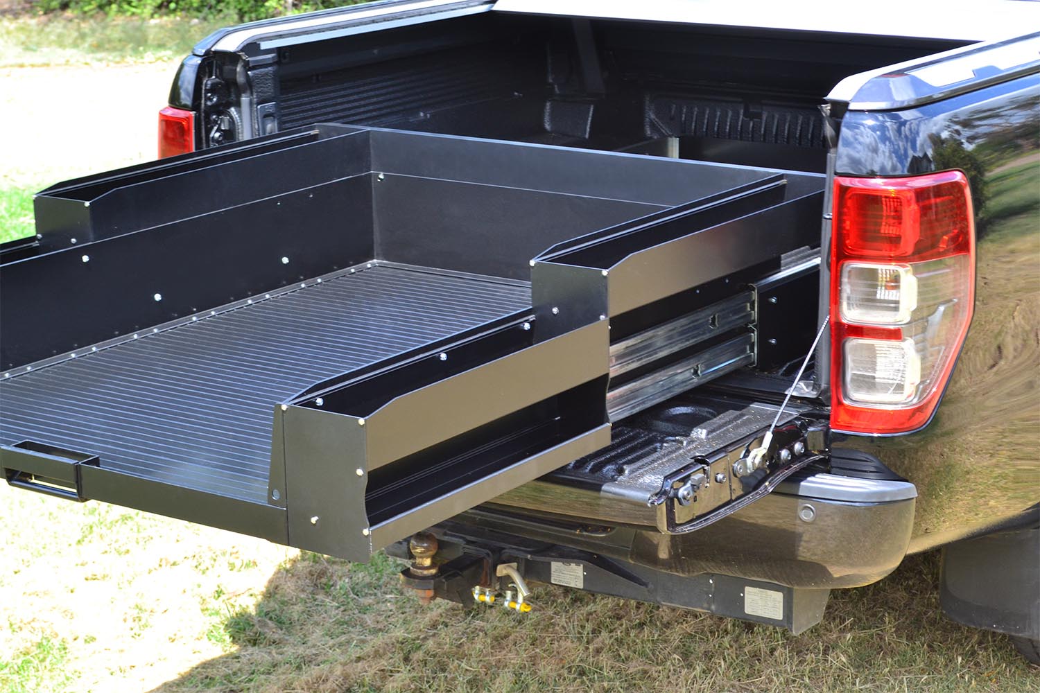 Ute tub bed slide shown in a Toyota Hilux QLD